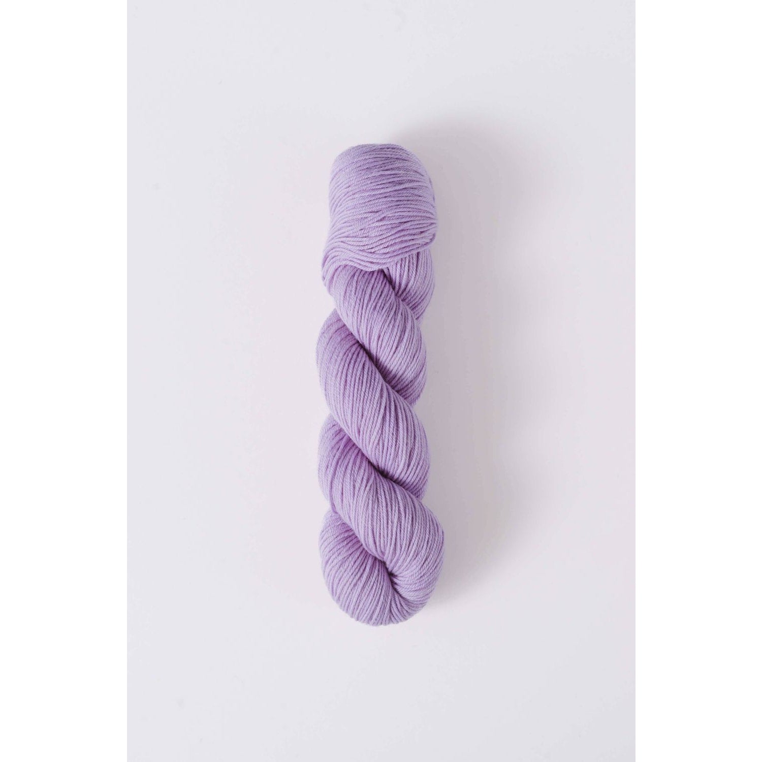 Quince & Co. superwash merino fingering yarn in soft lavender color skein
