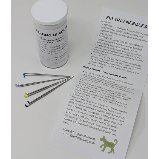 Set of needle felting needles with a variety of colors and an instruction guide from The Felted Dog