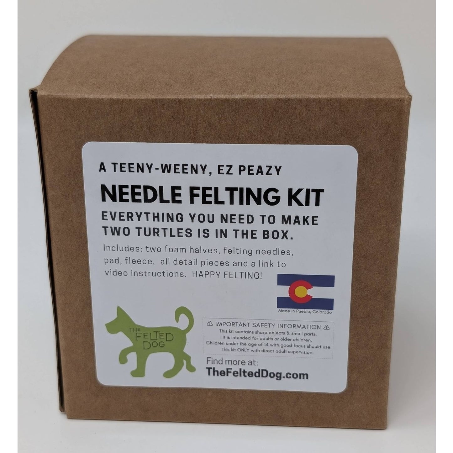 The Felted Dog Needle Felting Kit containing tools to make two turtle figures with detailed instructions