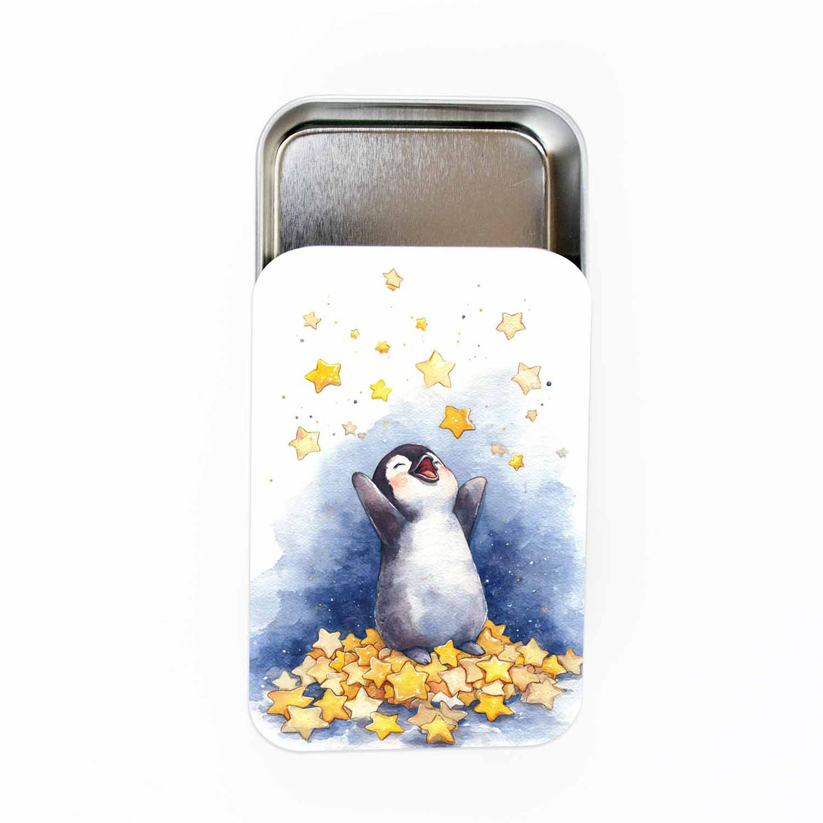 Twice Sheared Sheep gift box with gift featuring a cheerful penguin and star designs