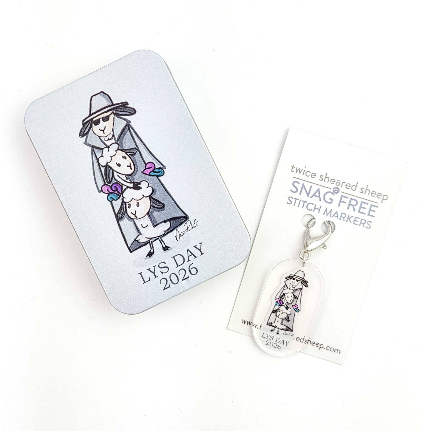 Twice Sheared Sheep stitch markers for crocheting featuring a cute design on a card and tin packaging