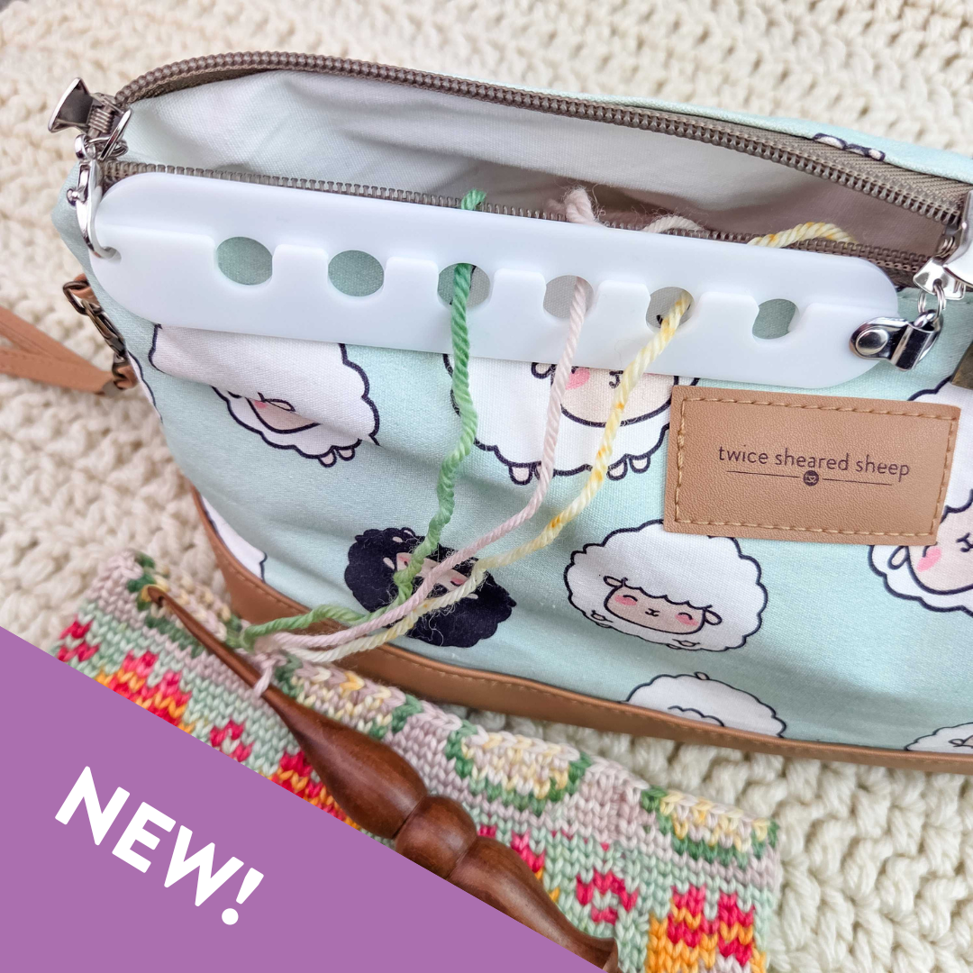 Twice Sheared Sheep knitting bag with sheep print and yarn threaded through for yarn retailers near me