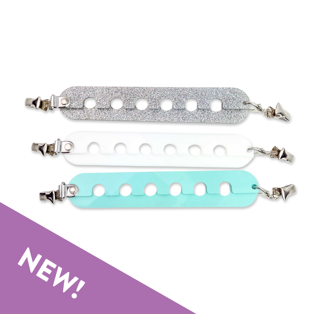 Set of three Twice Sheared Sheep yarn organizers in glitter, white, and mint colors for effective crafting