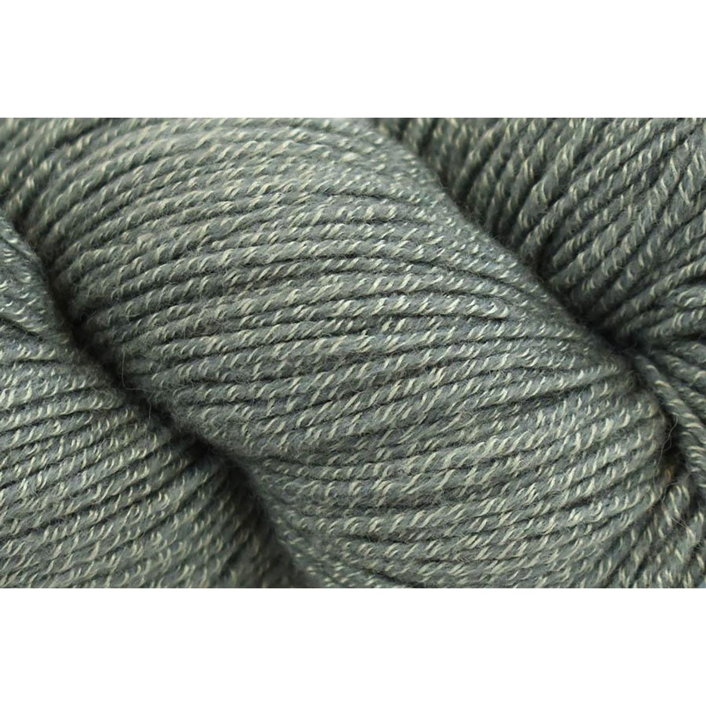 Universal Yarn Wool Pop in a soft green color perfect for knitting and crocheting projects