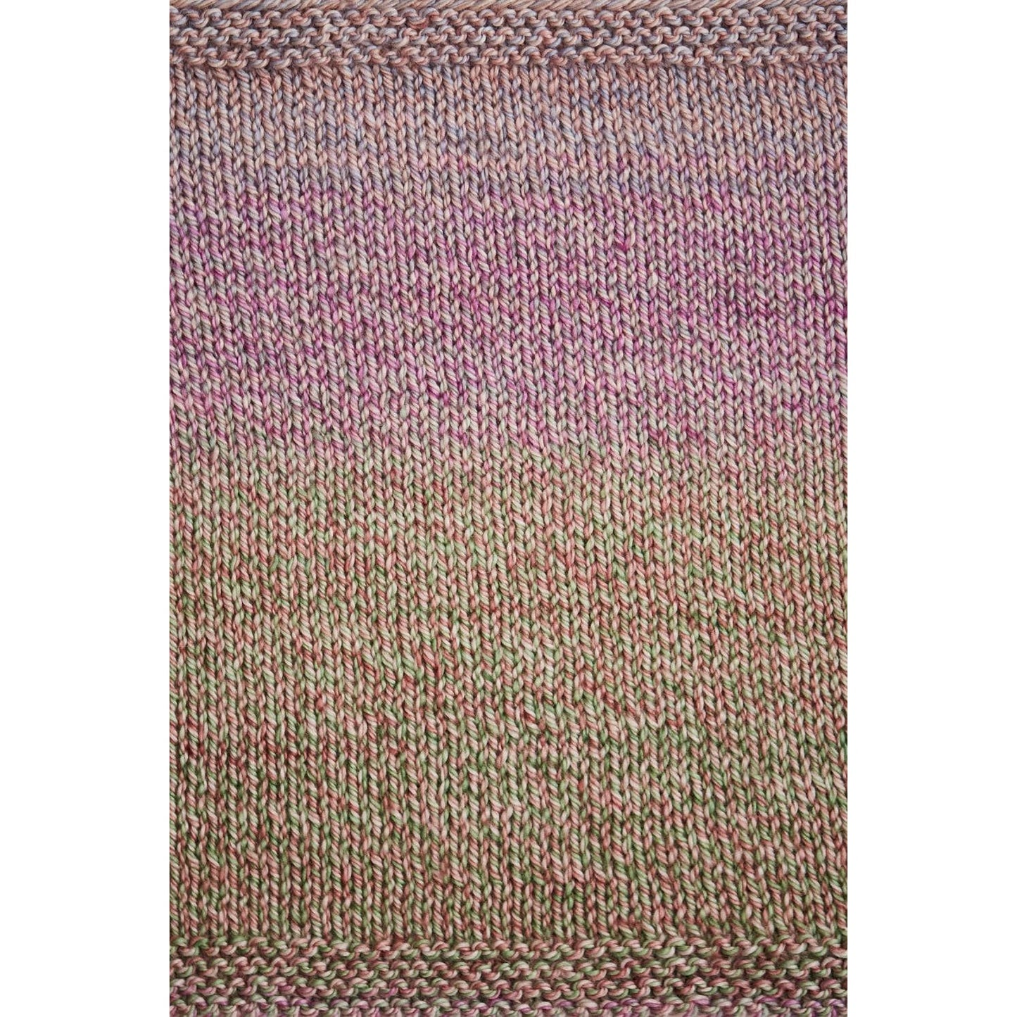 Urth Yarns Spiral Grain Light Worsted showcasing a beautiful gradient pattern in soft colors