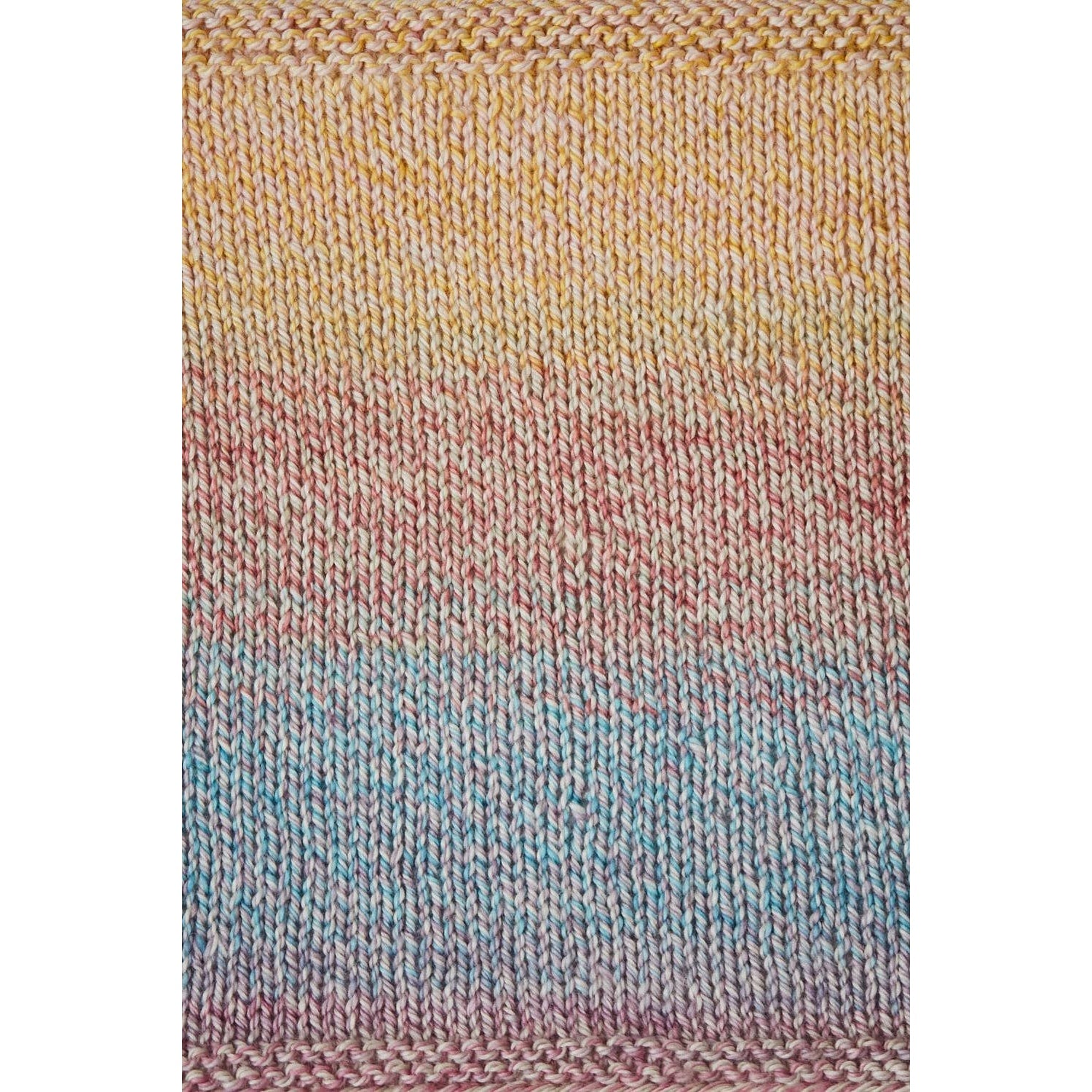 Urth Yarns Spiral Grain Light Worsted in soft gradient colors perfect for creating stunning knitwear