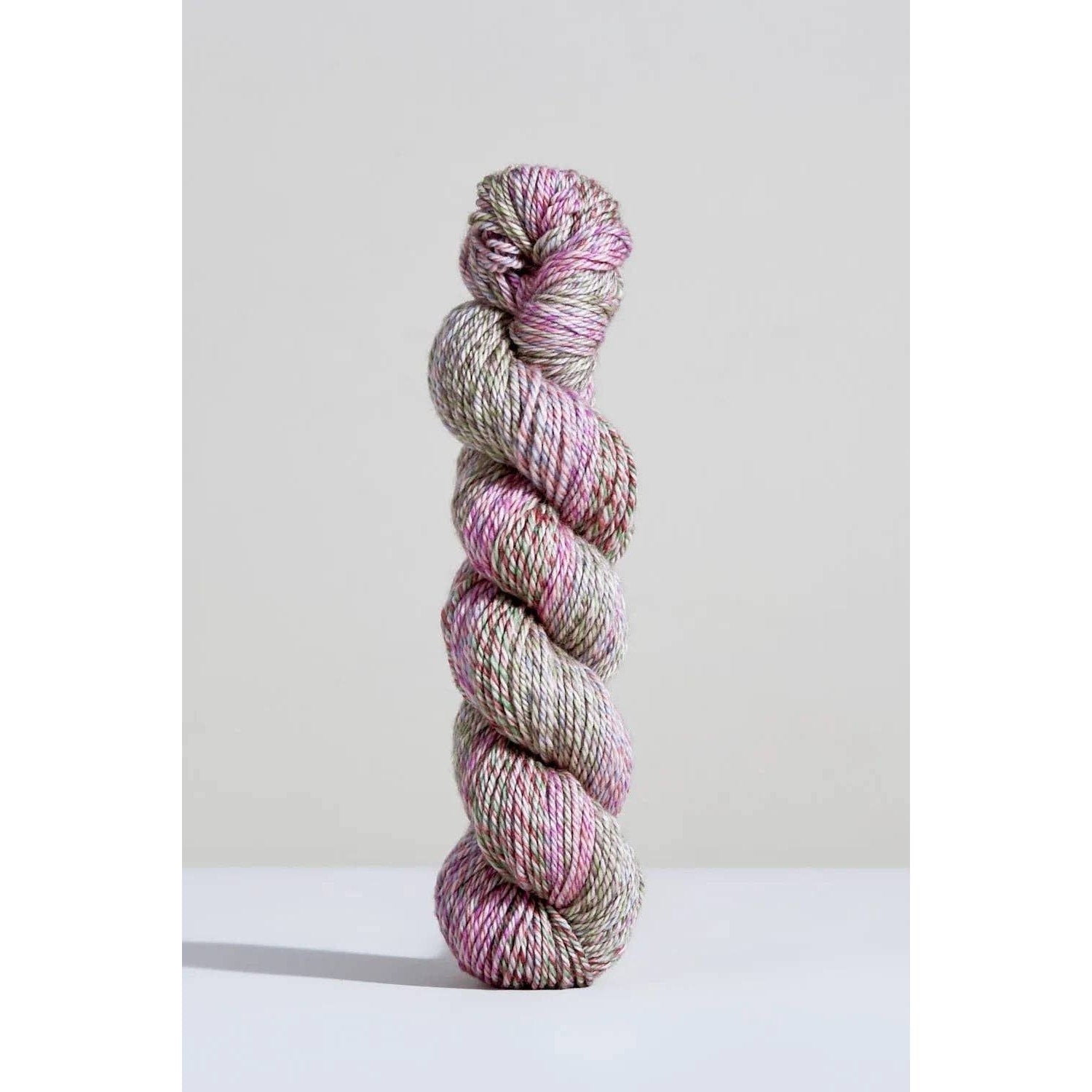 Urth Yarns Spiral Grain Light Worsted in soft pink and green tones for knitting and crafting projects
