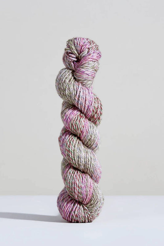 Urth Yarns Spiral Grain Light Worsted in soft pink and green tones for knitting and crafting projects