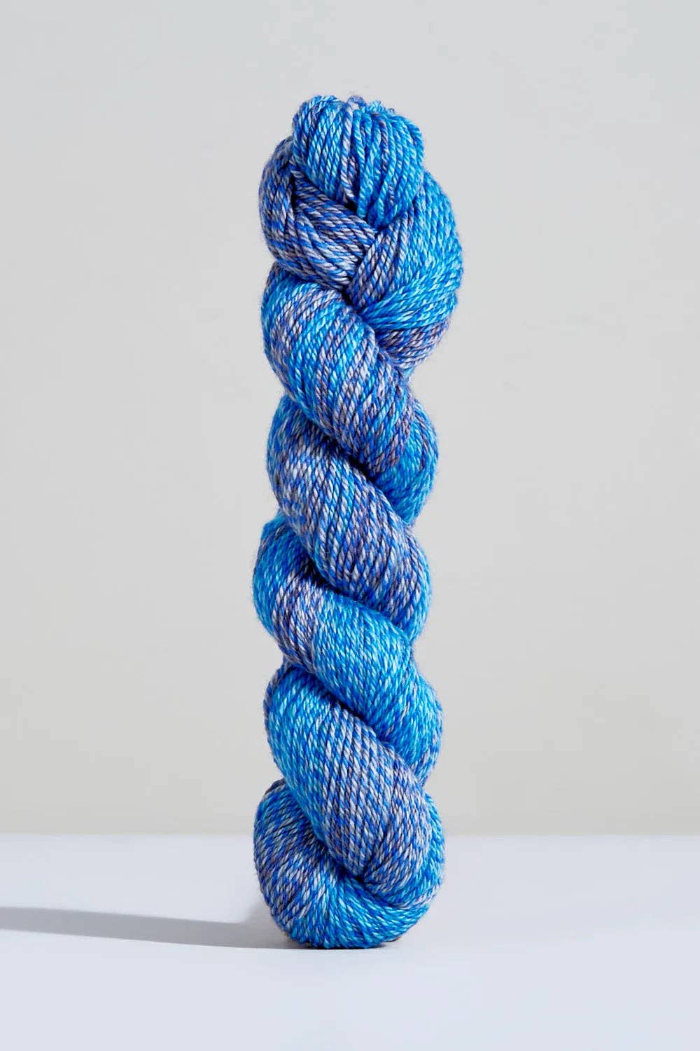Urth Yarns Spiral Grain Sport Blue Spruce soft twisted yarn in vibrant blue shades