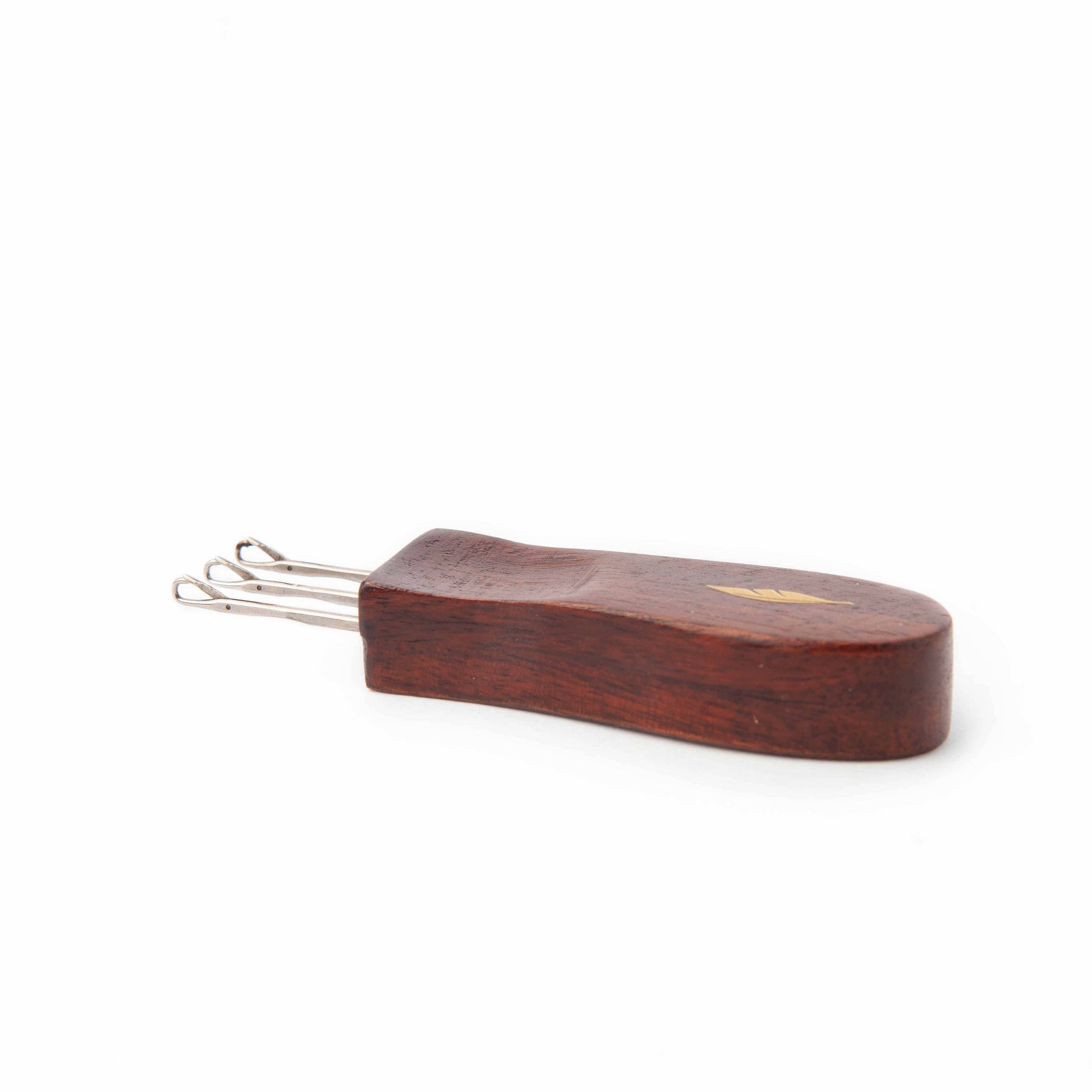 Twice Sheared Sheep i-cord tool with a wooden handle and multiple hooks for crafting projects