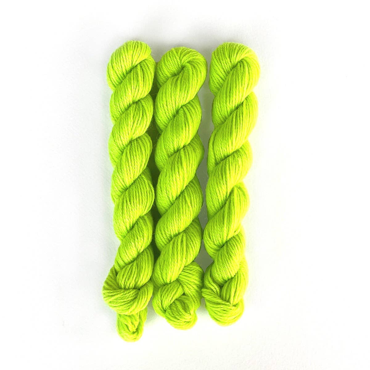Kelbourne Woolens Perennial Minis yarn in vibrant neon green set of three skeins