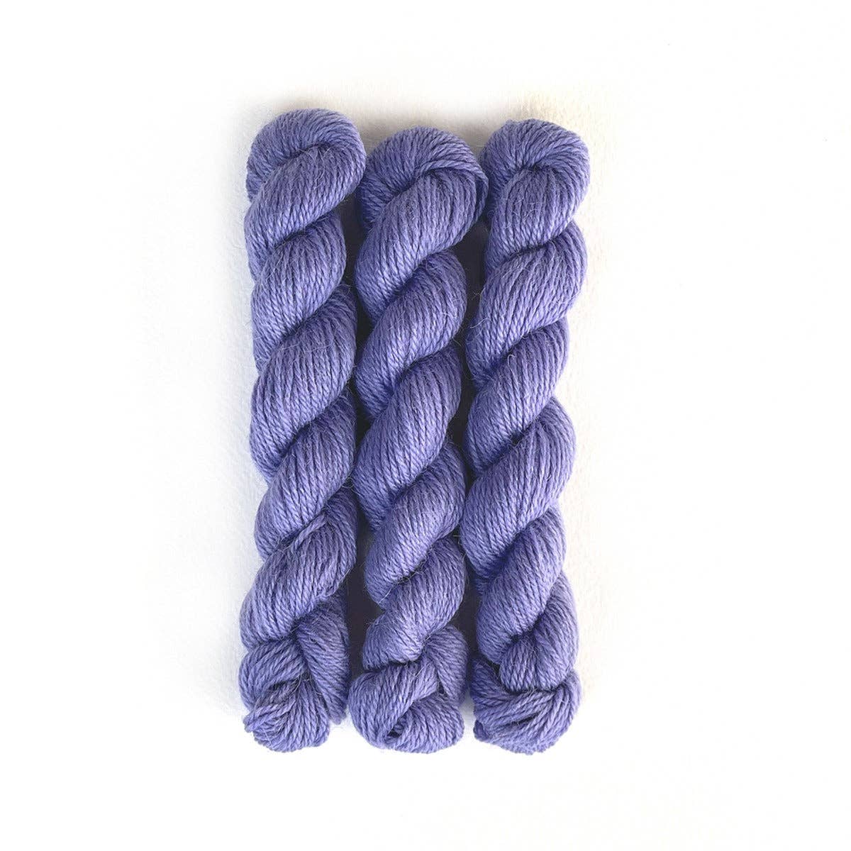 Kelbourne Woolens Perennial Minis yarn in soft lavender color, perfect for knitting and crochet projects