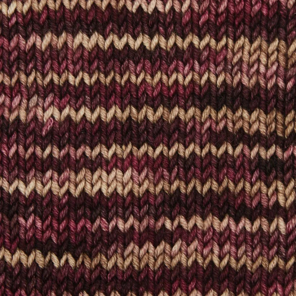 Close-up of KnitPro Viva Aero yarn in rich burgundy and brown tones, perfect for knitting projects