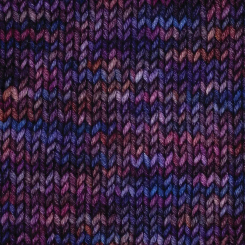 Close-up of KnitPro Viva Aero yarn in rich purple hues, perfect for vibrant knitting projects