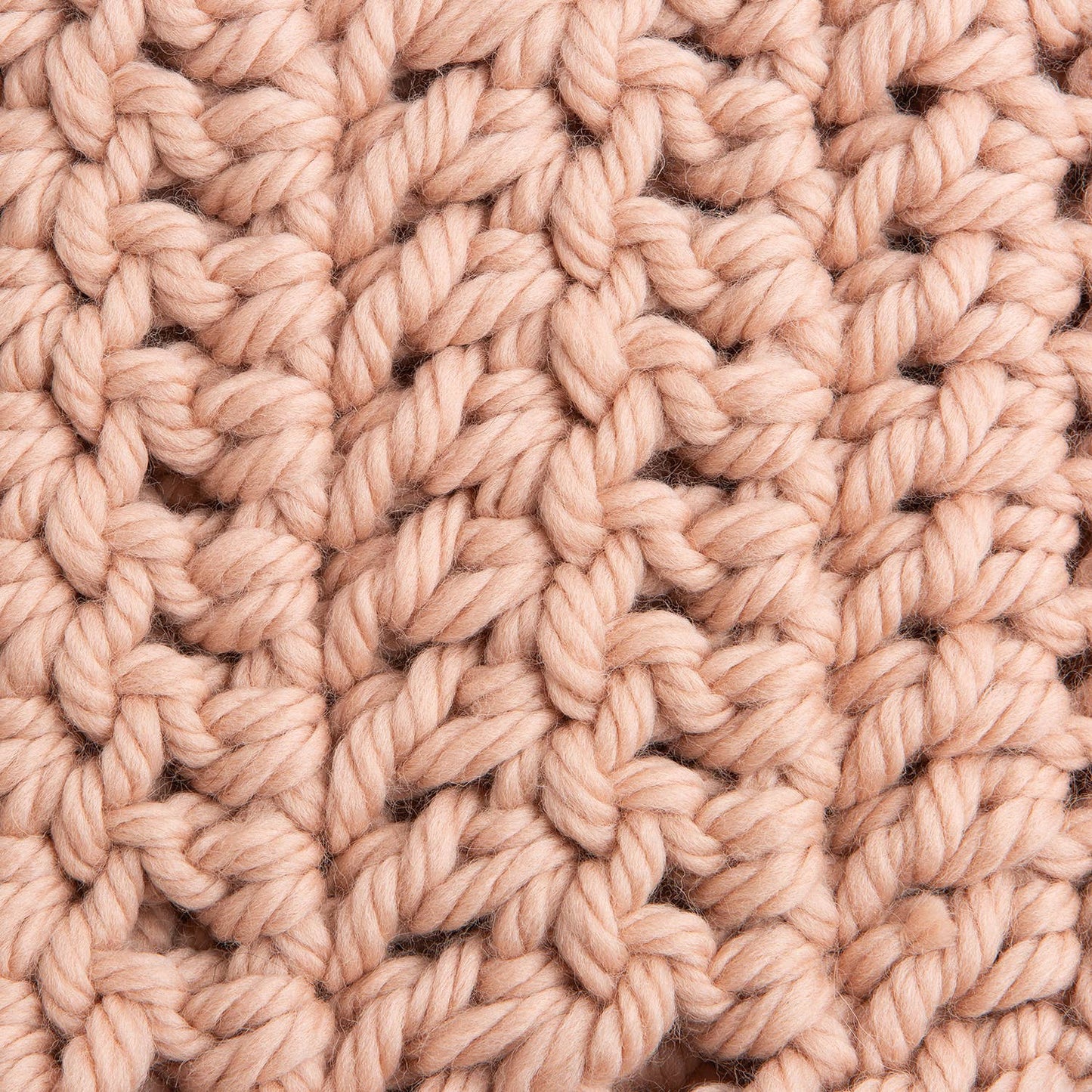 Wool Couture Company beginner crochet cowl kit close up of blush chunky yarn textured crochet stitches
