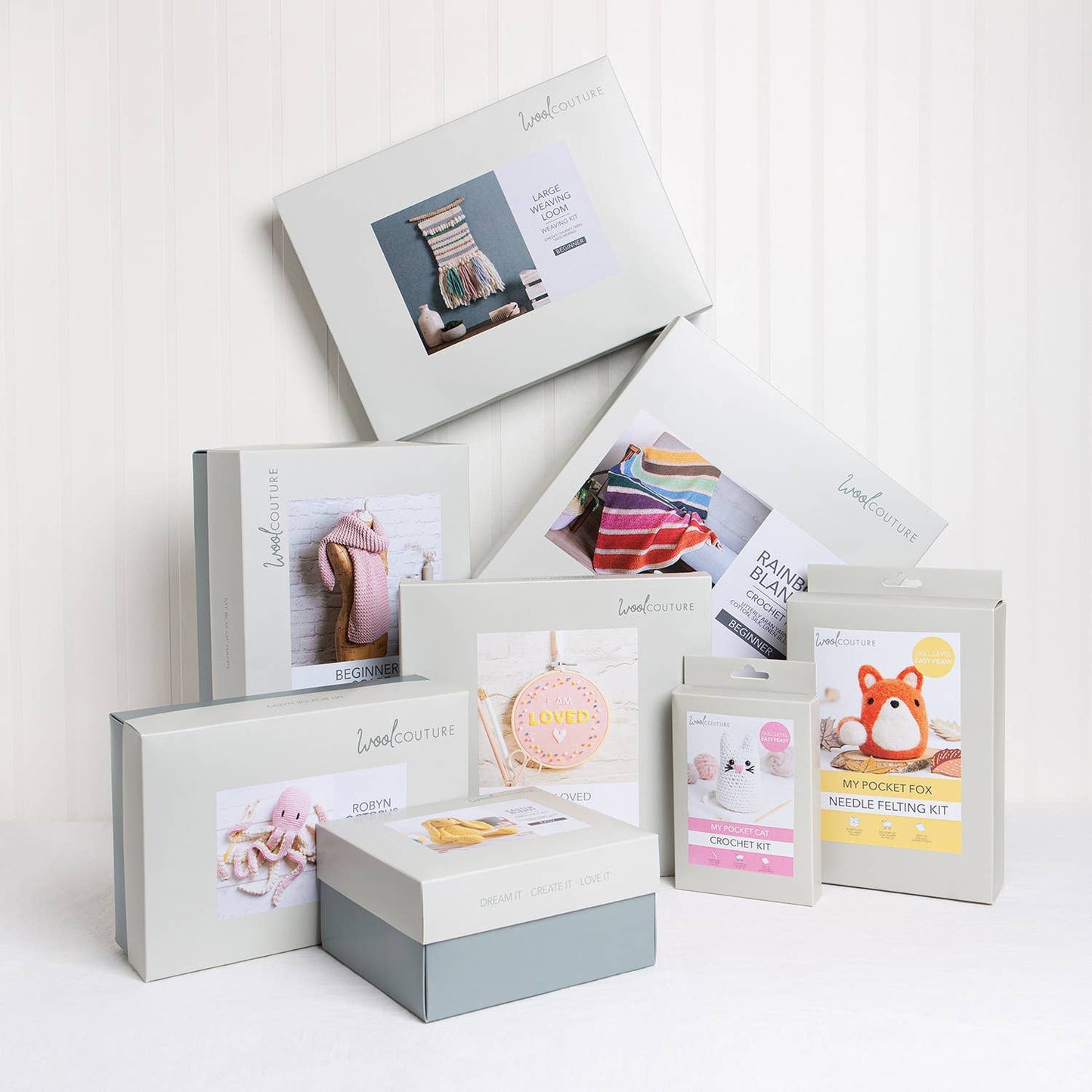 Wool Couture assortment of boxed craft kits including Christmas tree cross stitch kit and needle felting kit