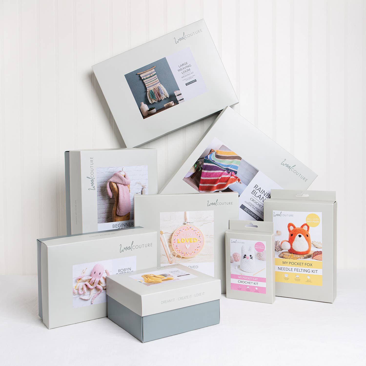 Wool Couture assortment of boxed craft kits including Christmas tree cross stitch kit and needle felting kit