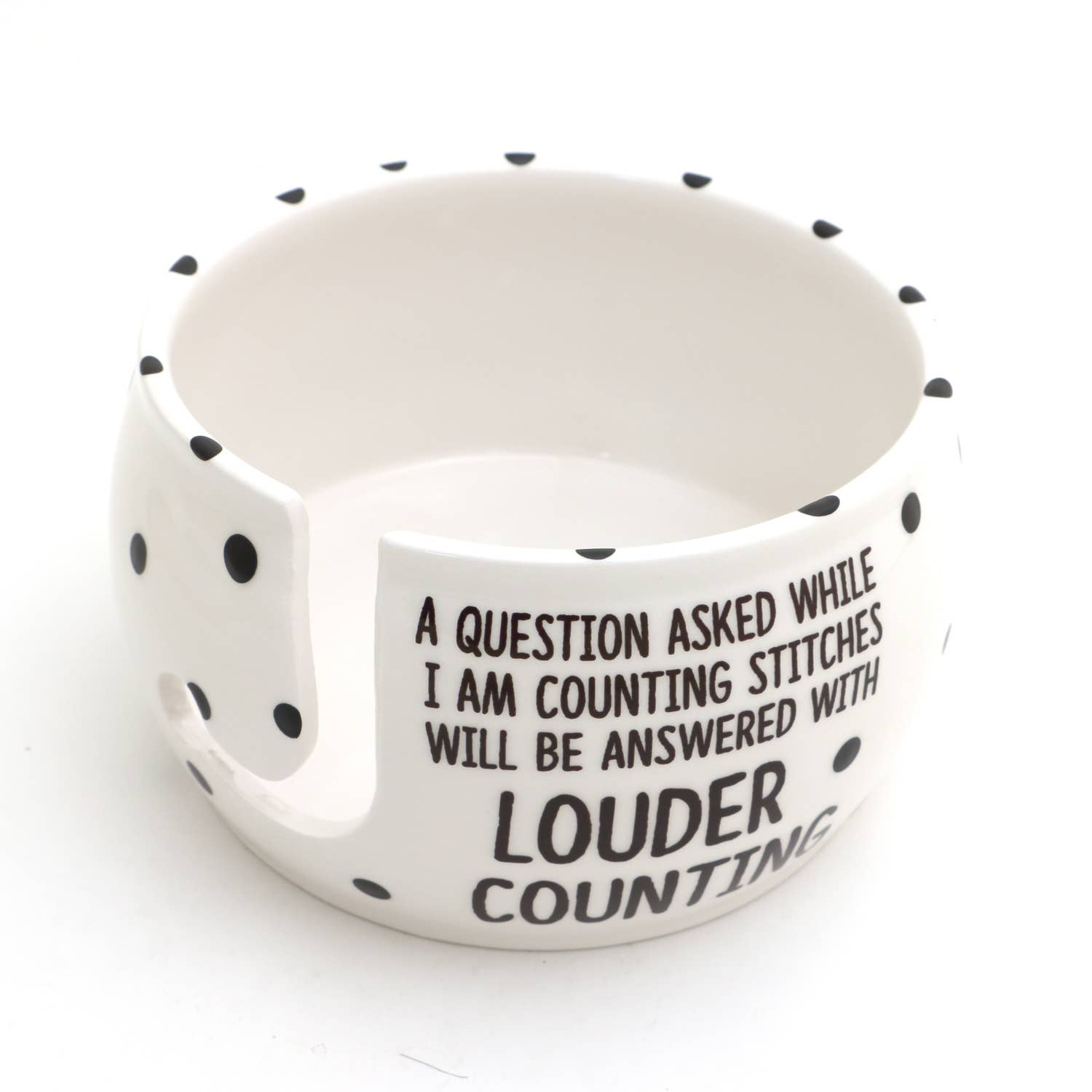 White ceramic yarn bowl for knitters with black polka dots and humorous text about counting stitches