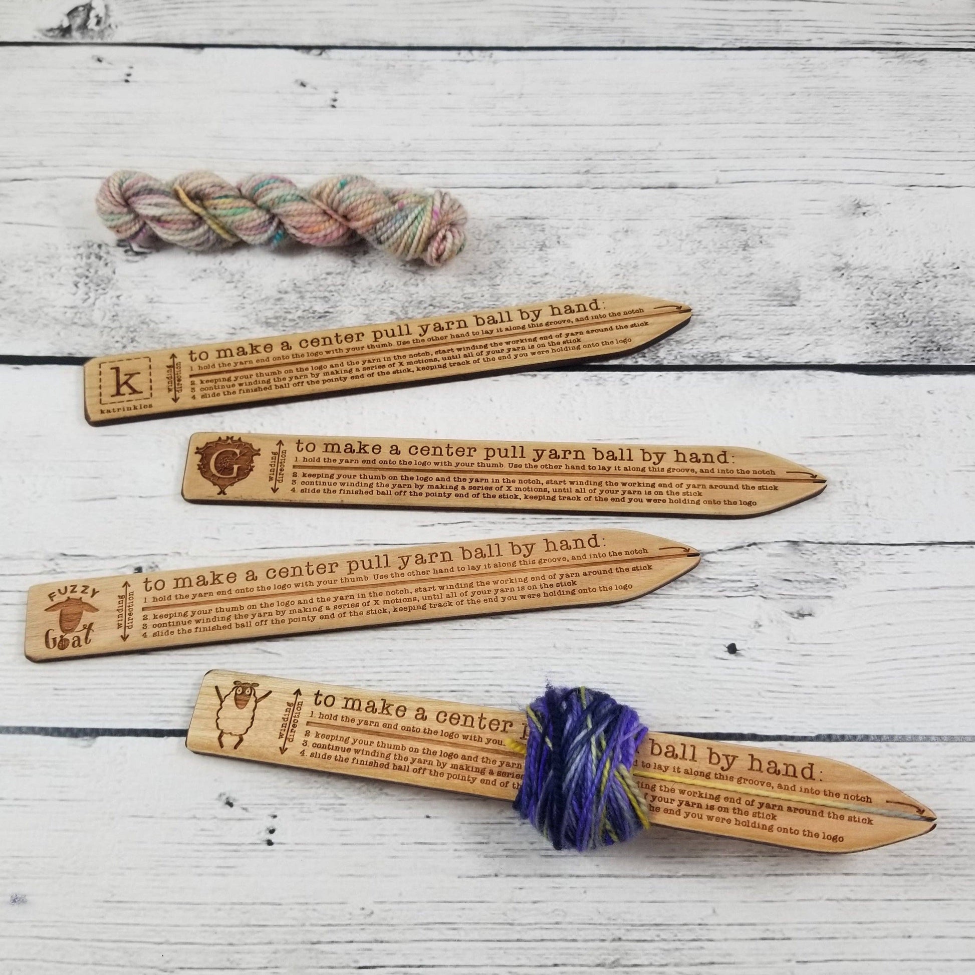 Katrinkles yarn winder tools for making center pull yarn balls by hand, featuring instructional designs